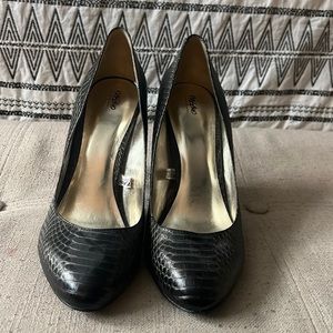 Brown and gold snakeskin heels.